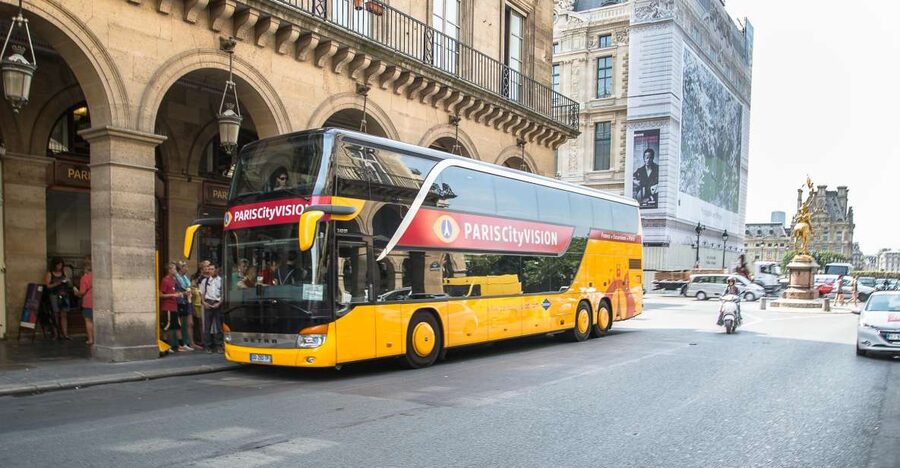 Paris: Openair Double Decker Bus Audio-Guided City Tour - What the enclosed bus is really like