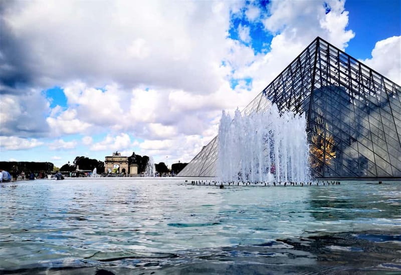 Paris: private city tour with seine river cruise - Carrousel du Louvre, Tuileries, and Place de la Concorde