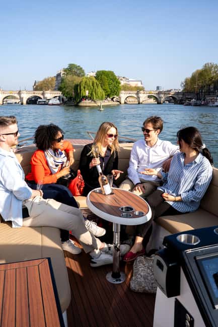 Paris: Private Small Boat Cruise with Rosé and Macarons - The Eiffel Tower from the water