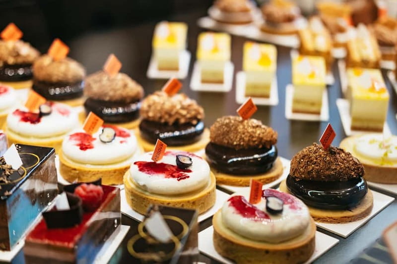 Paris: Saint Germain des Prés Guided Foodie Walking Tour - The cafe-lined streets of Saint Germain des Prés
