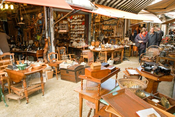 Paris: Saint Ouen Flea Market Guided Tour with Local Guide - Grand furniture, wall hangings, and royal-scale decoration