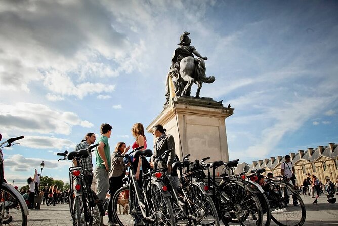 Paris Small Group Guided Bike Tour of Must-See Sights - Place de la Concorde and the Tuileries show royal Paris