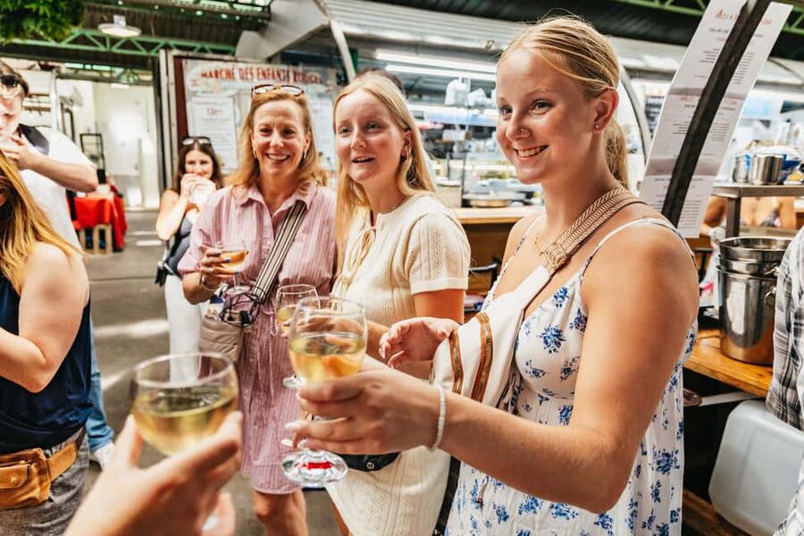 Paris: Walking Food Tour with Cheese, Wine and Delicacies - What the first tasting stops may reveal
