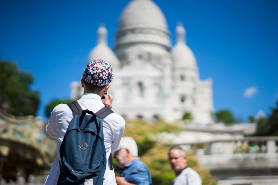 Paris: Walking Tour of Montmartre - Reaching Sacré-Cœur after the final climb