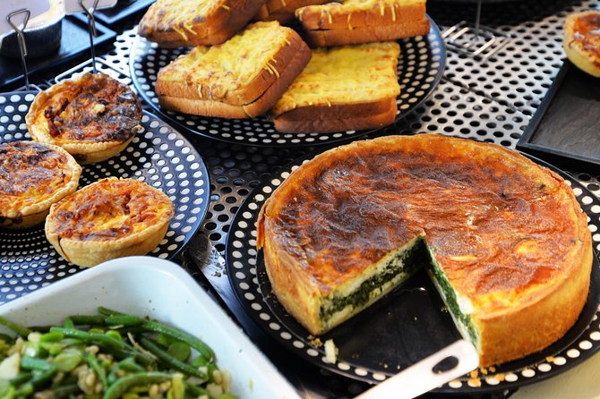 PRIVATE Paris Food Tour in Saint Germain District: 10 Tastings - Place de l’Odéon adds architecture between bites