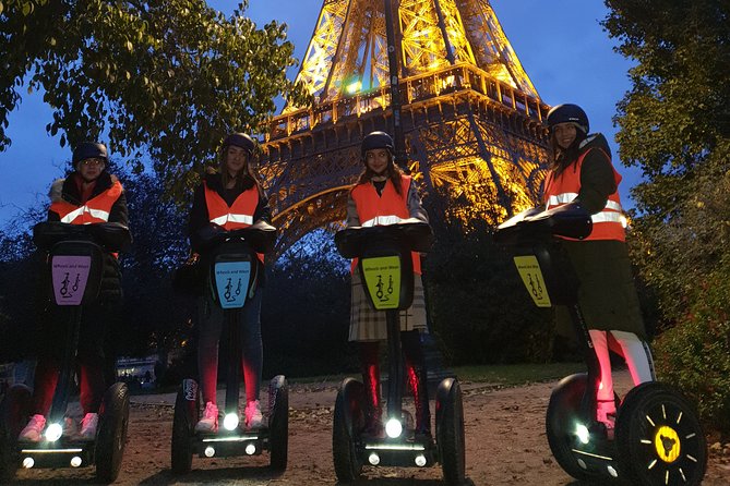 Segway by night ! Illuminated Paris - Stop 1: the Eiffel Tower under evening lights