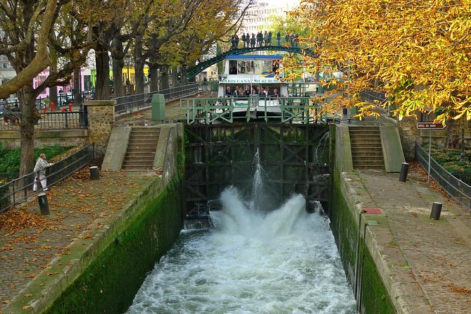 Seine River Cruise and Paris Canals Tour - Entering Canal Saint-Martin and the Bastille tunnel