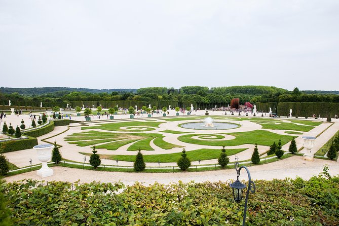 Versailles Château and Gardens Walking Tour from Paris by Train - Walking conditions and pace