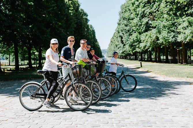 Versailles Domain Bike Tour with Palace Entry by Train from Paris - Starting at Le Peloton Café in the Marais