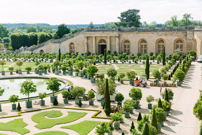 Versailles Half Day Guided Bike Tour - Riding beside the Grand Canal