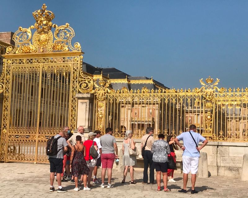 Versailles: Palace Guided Tour with Skip-the-Line Ticket - Meeting the guide at Louis XIV’s statue